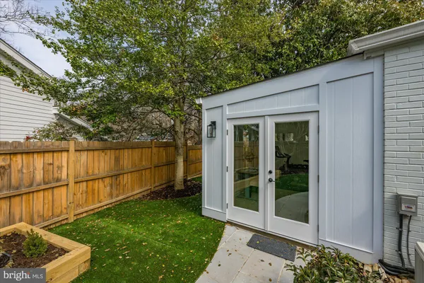 a backyard of a house with lots of green space