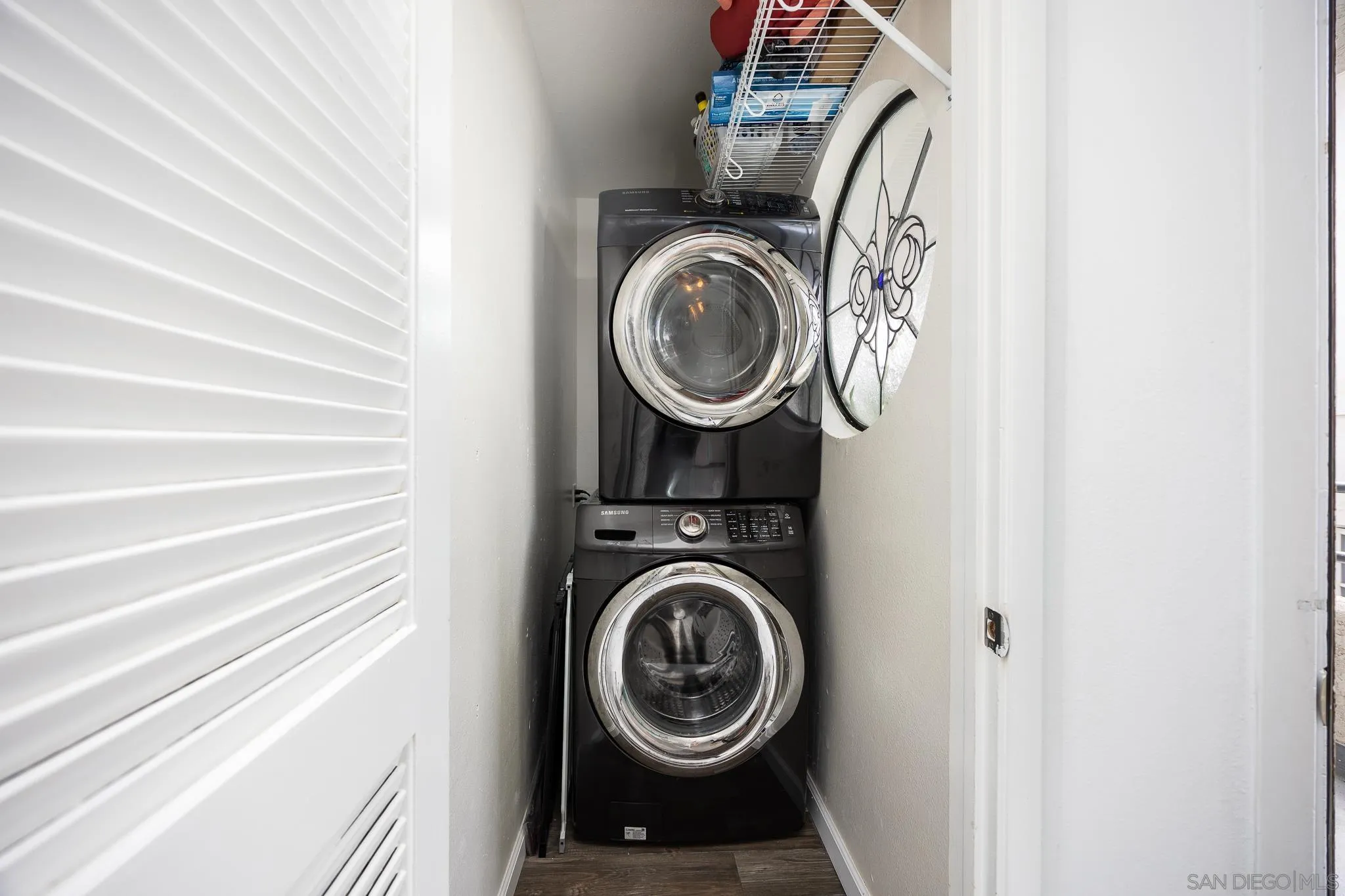 3568 Front Street, Unit D San Diego, CA 92103 - Photo 17 of 24 a view of washer and dryer in a utility room