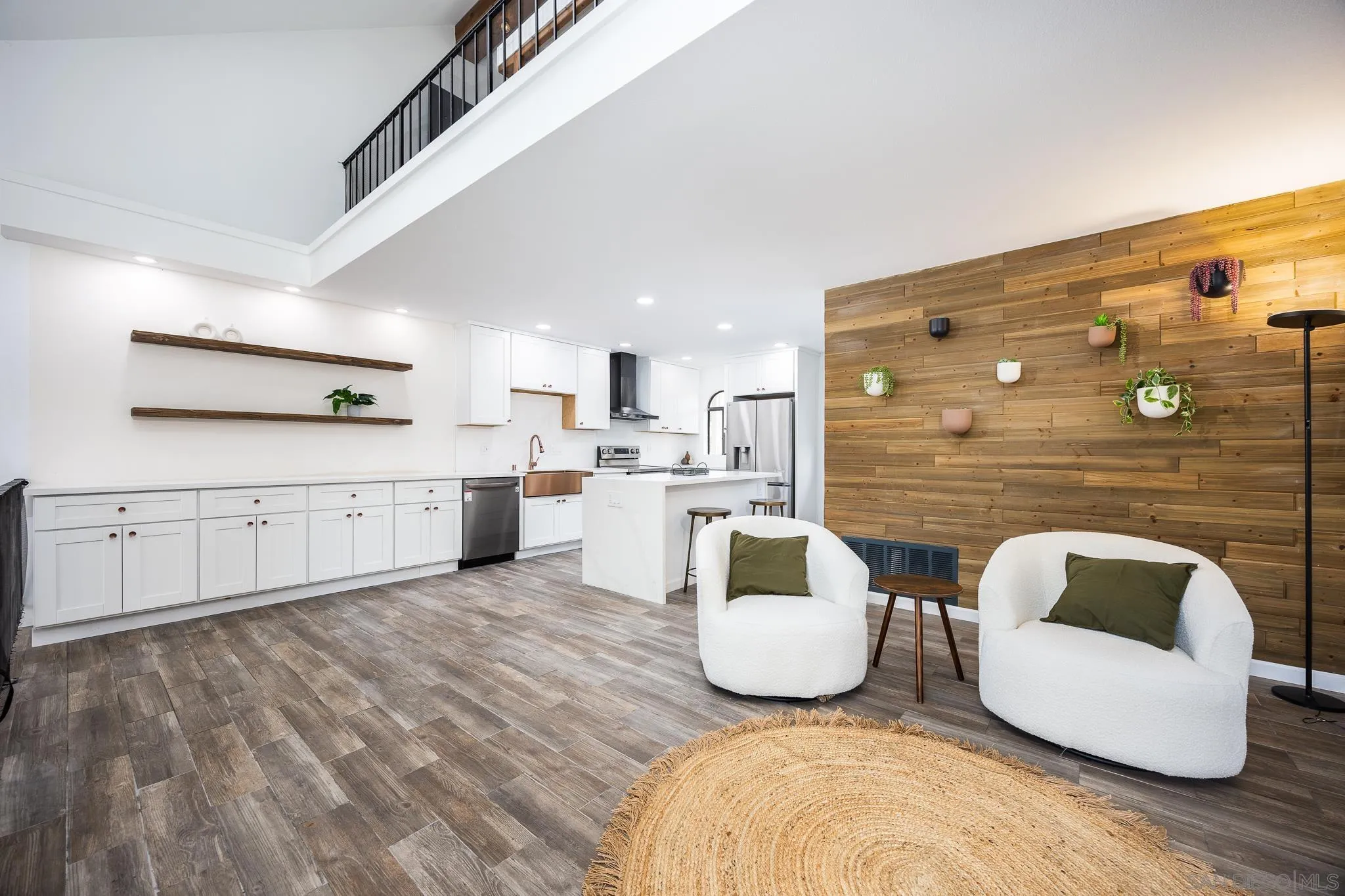 3568 Front Street, Unit D San Diego, CA 92103 - Photo 2 of 24 a large room with wooden floor