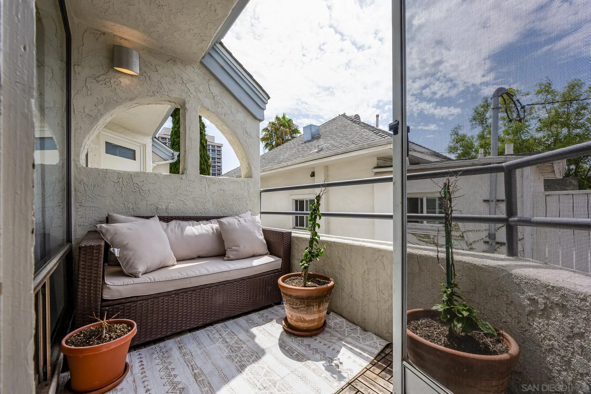 3568 Front Street, Unit D San Diego, CA 92103 - Photo 5 of 24 a view of a porch with furniture