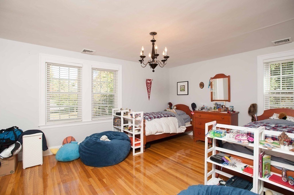 16 Summit Road Wellesley, MA 02482 - Photo 13 of 23 a bed room with bed and a window