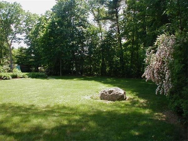16 Summit Road Wellesley, MA 02482 - Photo 18 of 23 a backyard of a house with trees