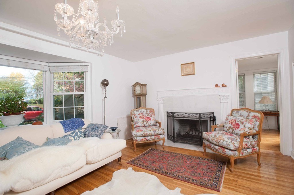 16 Summit Road Wellesley, MA 02482 - Photo 5 of 23 a living room with furniture and a fireplace