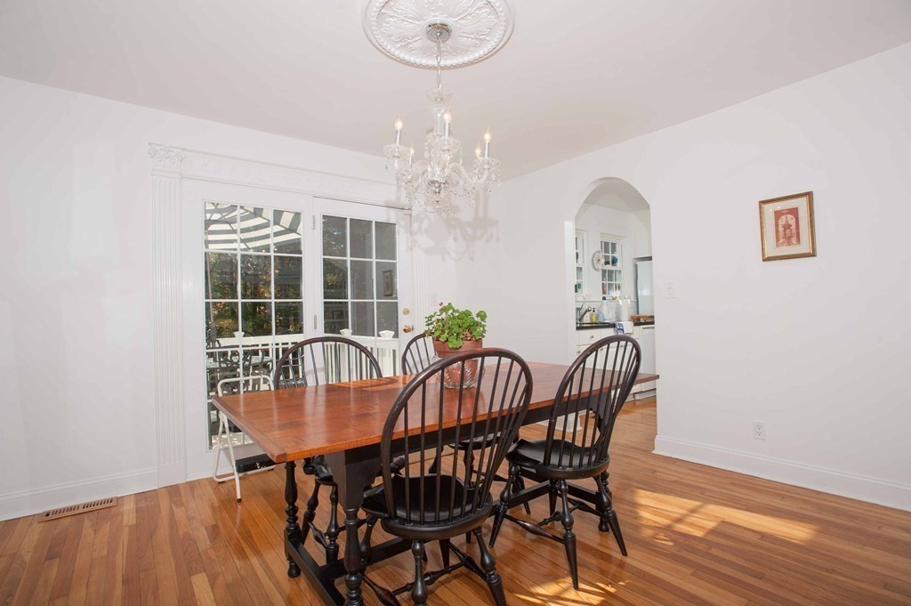 16 Summit Road Wellesley, MA 02482 - Photo 8 of 23 a view of a dining room with furniture wooden floor and chandelier