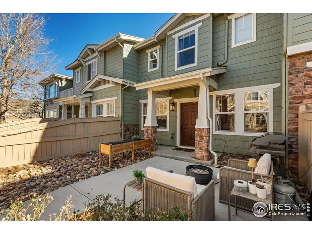 a view of multiple house with many windows
