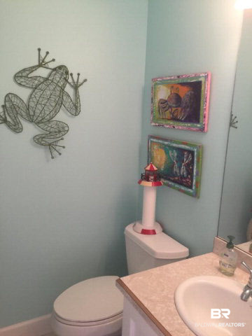 26595 Marina Road Orange Beach, AL 36561 - Photo 15 of 29 half bath opening into the hall