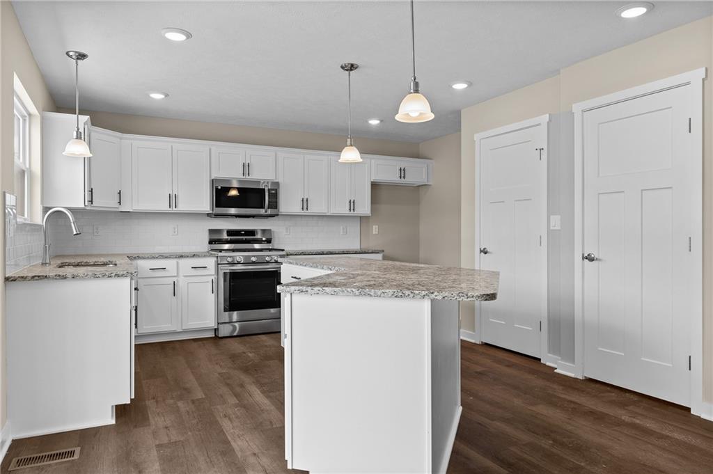 2566 Willowbrook Road Pittsburgh, PA 15241 - Photo 8 of 26 Kitchen includes a Pantry for storage (left door, right door leads to the basement)