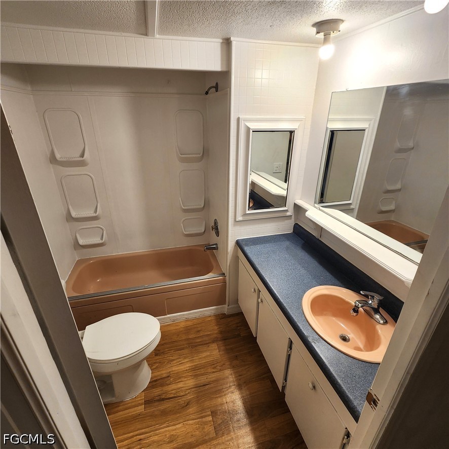 110 Gaslight Avenue North Fort Myers, FL 33917 - Photo 11 of 22 a bathroom with a sink a toilet and bathtub