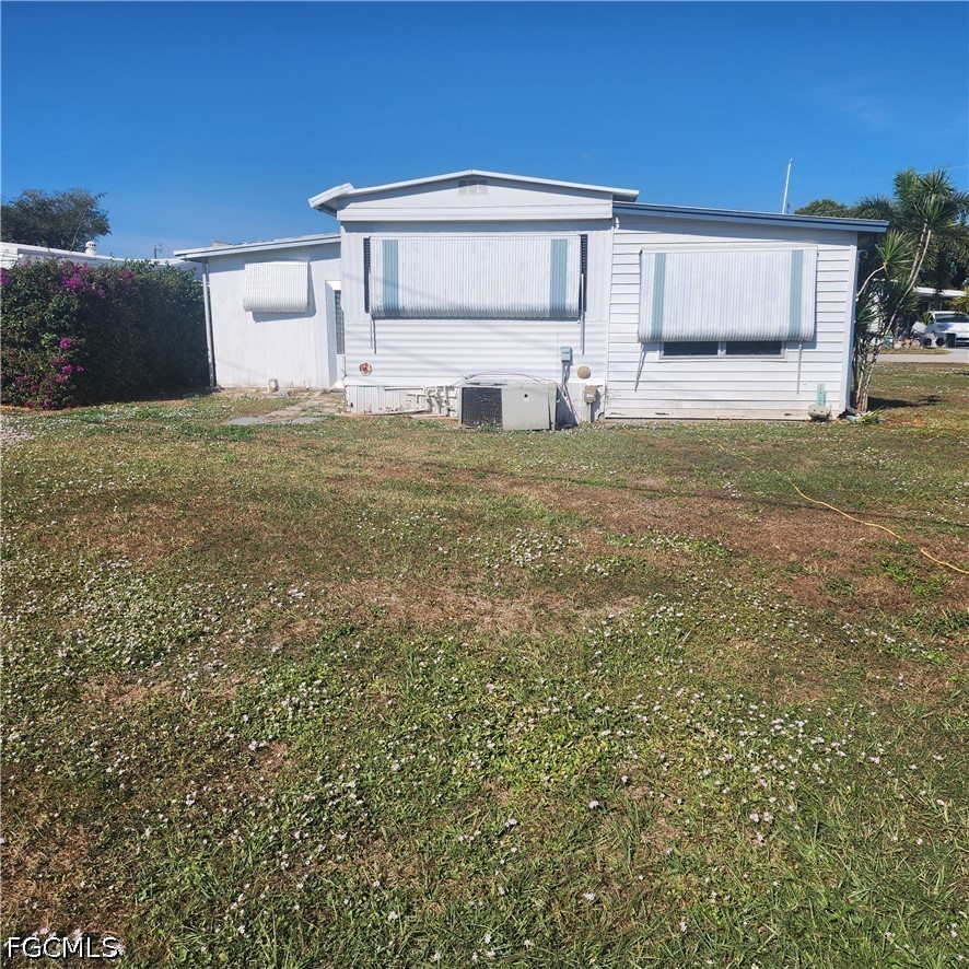 110 Gaslight Avenue North Fort Myers, FL 33917 - Photo 20 of 22 a house view with a outdoor space