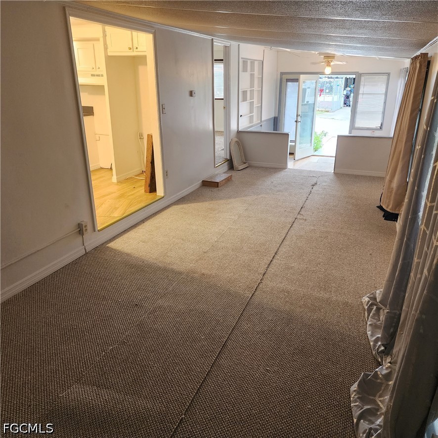 110 Gaslight Avenue North Fort Myers, FL 33917 - Photo 8 of 22 a view of empty room with front door
