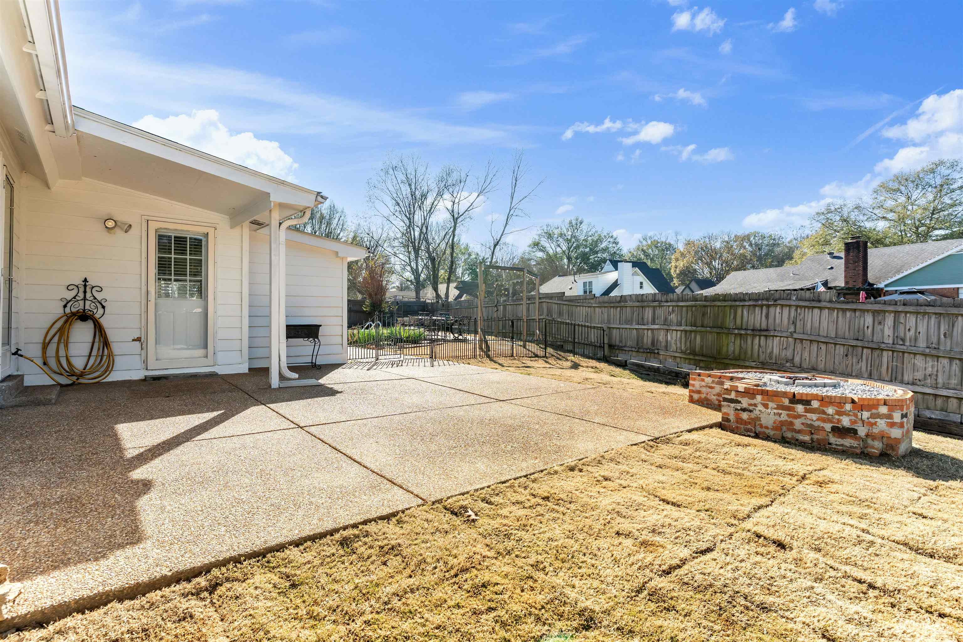 301 East Harpers Ferry Road Collierville, TN 38017 - Photo 34 of 39 Fenced backyard featuring a patio