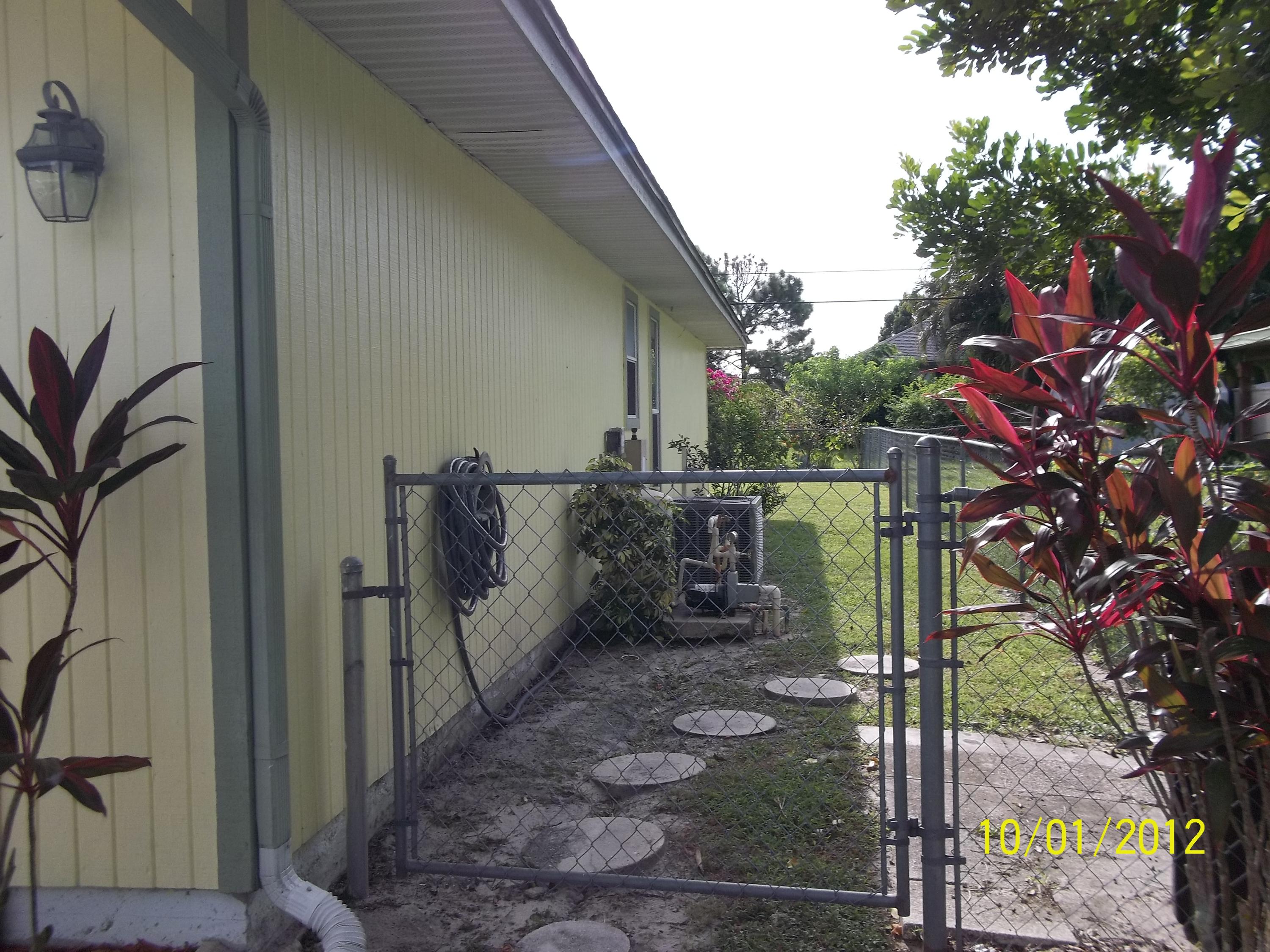 1057 Southwest Fenway Road Port St. Lucie, FL 34953 - Photo 18 of 21 side view