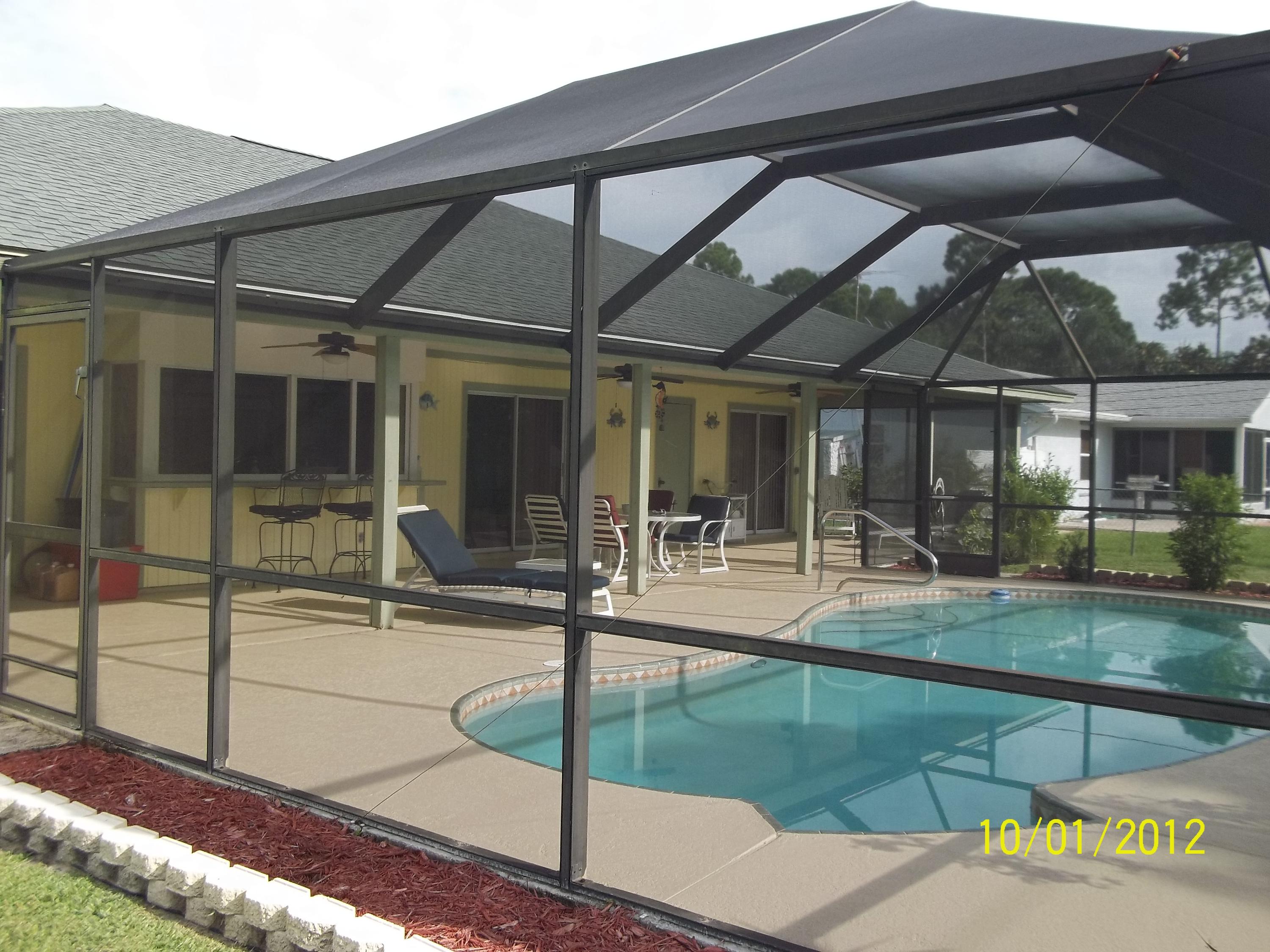 1057 Southwest Fenway Road Port St. Lucie, FL 34953 - Photo 2 of 21 rear pool 2