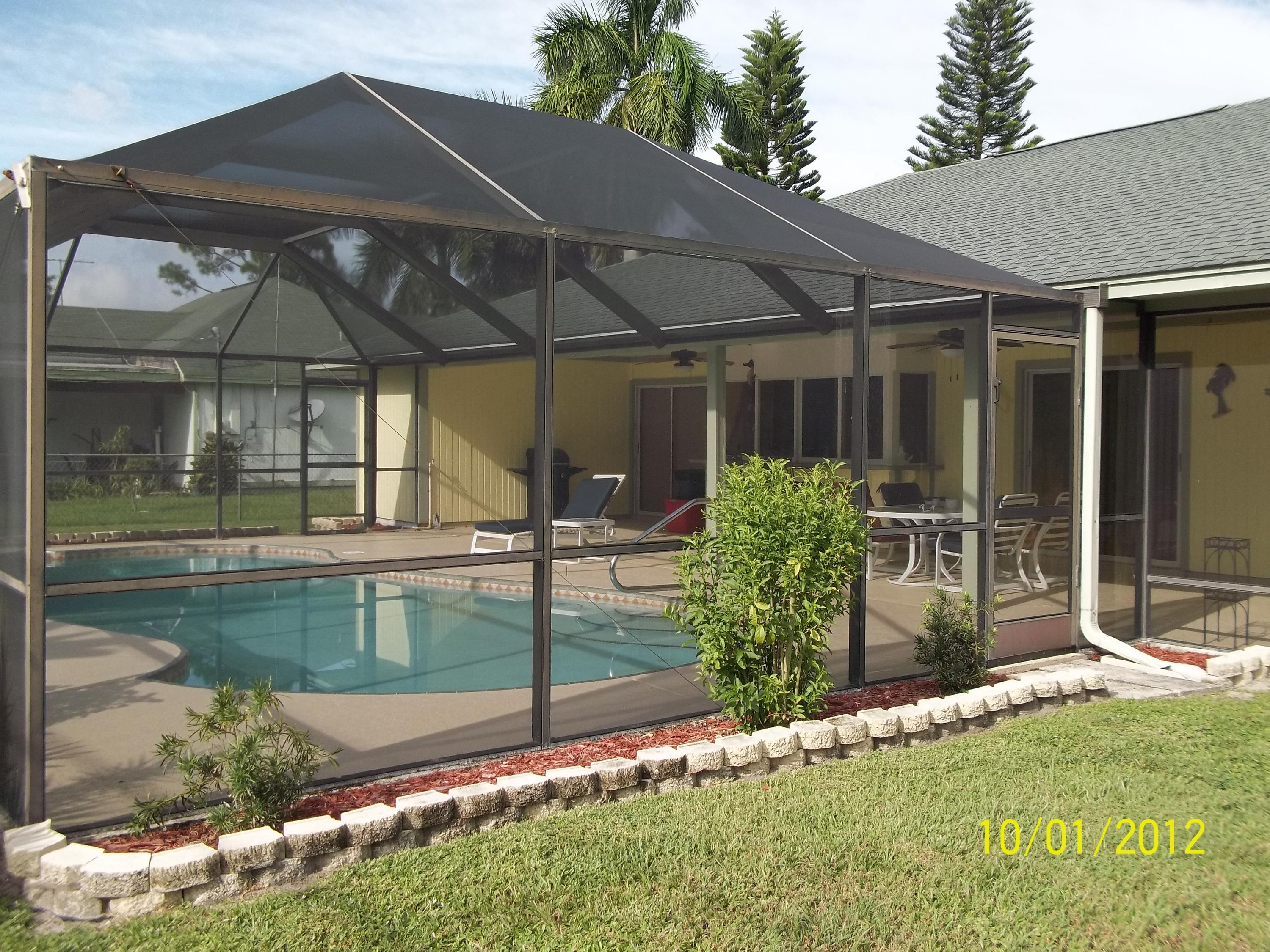 1057 Southwest Fenway Road Port St. Lucie, FL 34953 - Photo 21 of 21 rear pool