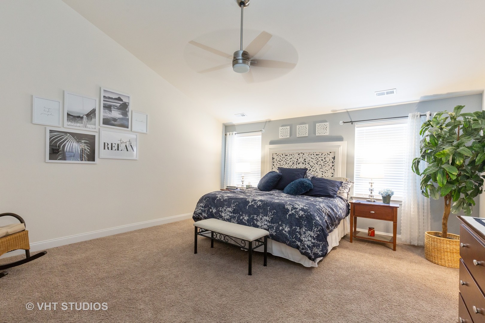 1175 Falcon Ridge Drive, Unit 1175 Elgin, IL 60124 - Photo 11 of 17 a bedroom with a bed and a potted plant on the dresser