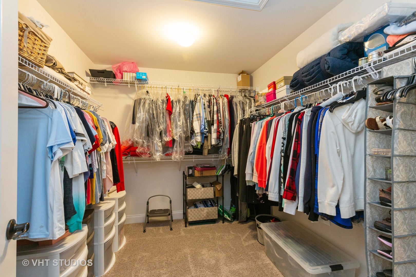 1175 Falcon Ridge Drive, Unit 1175 Elgin, IL 60124 - Photo 13 of 17 a view of walk in closet with clothes