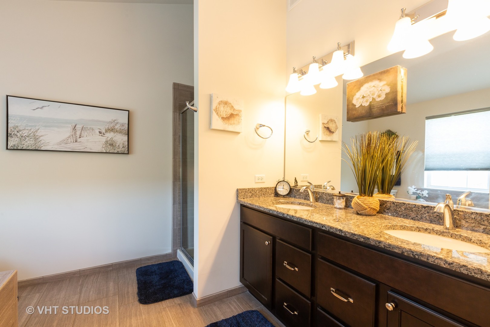 1175 Falcon Ridge Drive, Unit 1175 Elgin, IL 60124 - Photo 14 of 17 a bathroom with a sink and a mirror