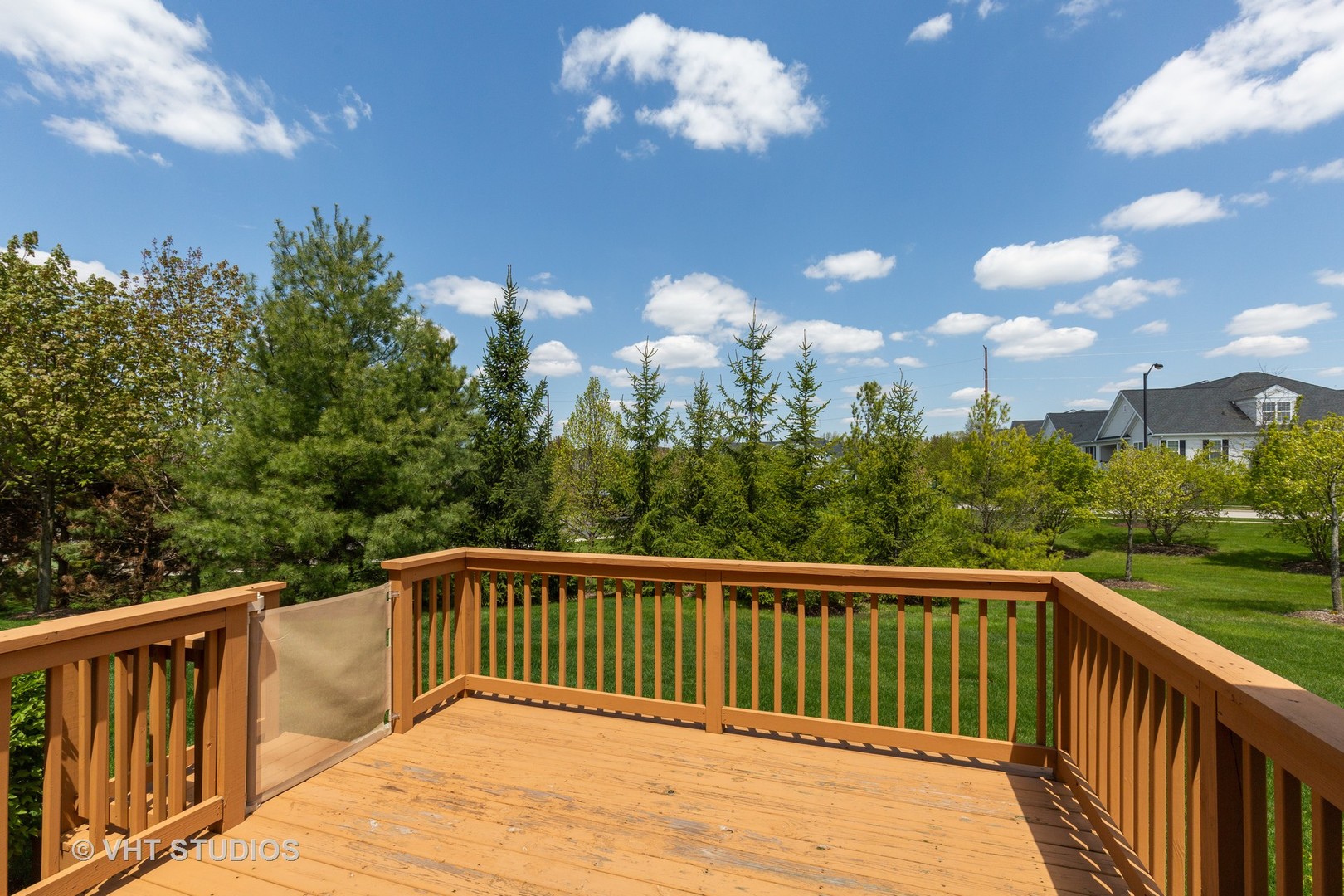 1175 Falcon Ridge Drive, Unit 1175 Elgin, IL 60124 - Photo 16 of 17 a view of a balcony with wooden floor