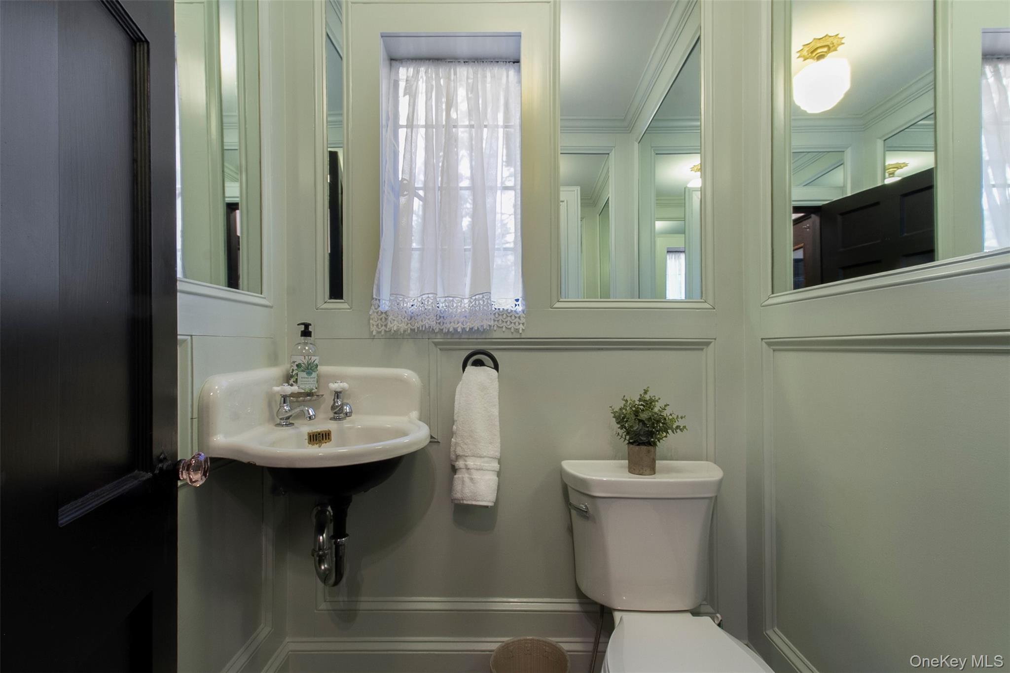 9 Rye Road Rye, NY 10580 - Photo 18 of 50 Powder room off of entry foyer.