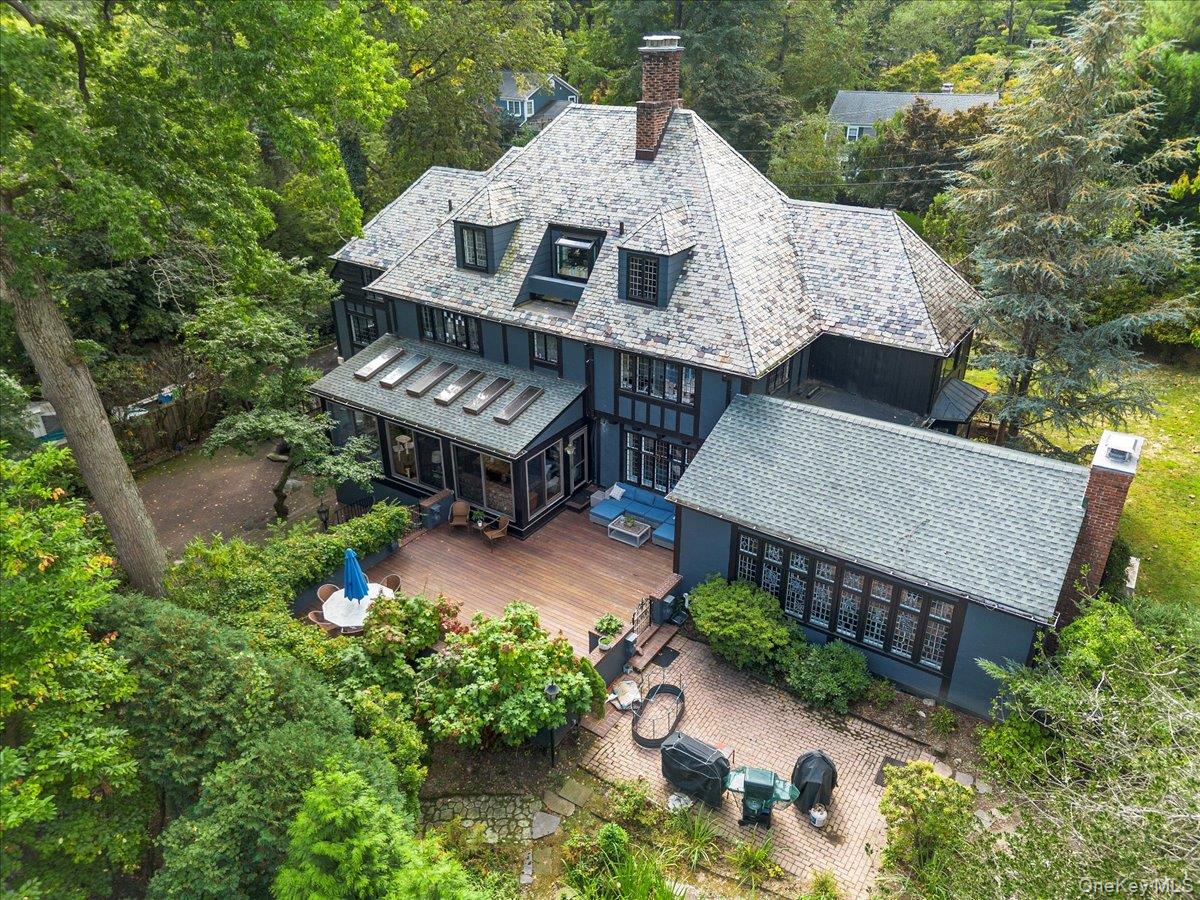 9 Rye Road Rye, NY 10580 - Photo 2 of 50 Bright Tudor in beautiful Greenhaven neighborhood, with inviting mature perennial flowering gardens, deck and patios