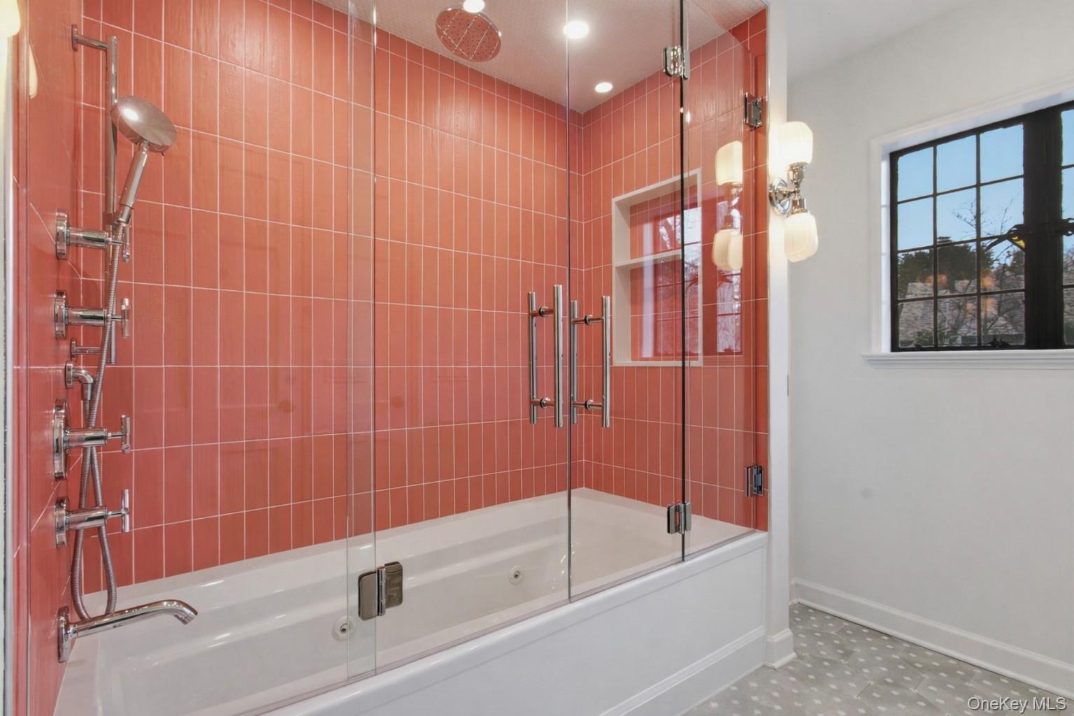 9 Rye Road Rye, NY 10580 - Photo 30 of 50 a bathroom with a bathtub and a shower