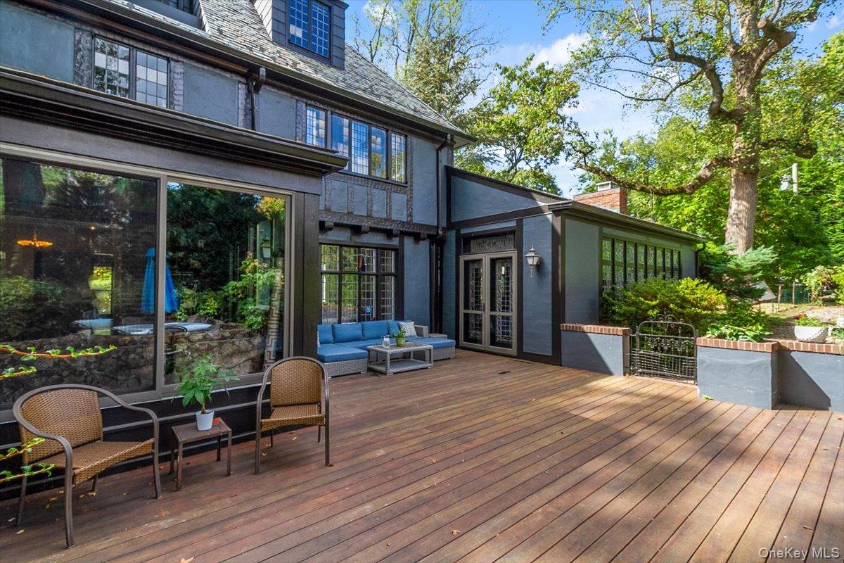 9 Rye Road Rye, NY 10580 - Photo 38 of 50 Spacious deck perfect for entertaining with gorgeous mature perennial flowering gardens.
