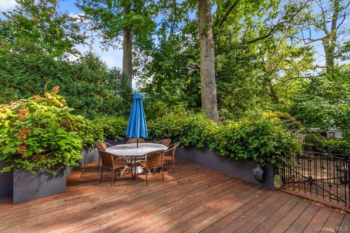 9 Rye Road Rye, NY 10580 - Photo 39 of 50 Spacious deck perfect for entertaining with gorgeous mature perennial flowering gardens.