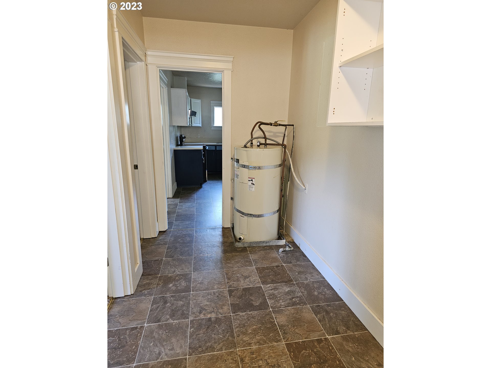2644 Edison Street Eugene, OR 97402 - Photo 12 of 29 a hallway with sliding door and yard