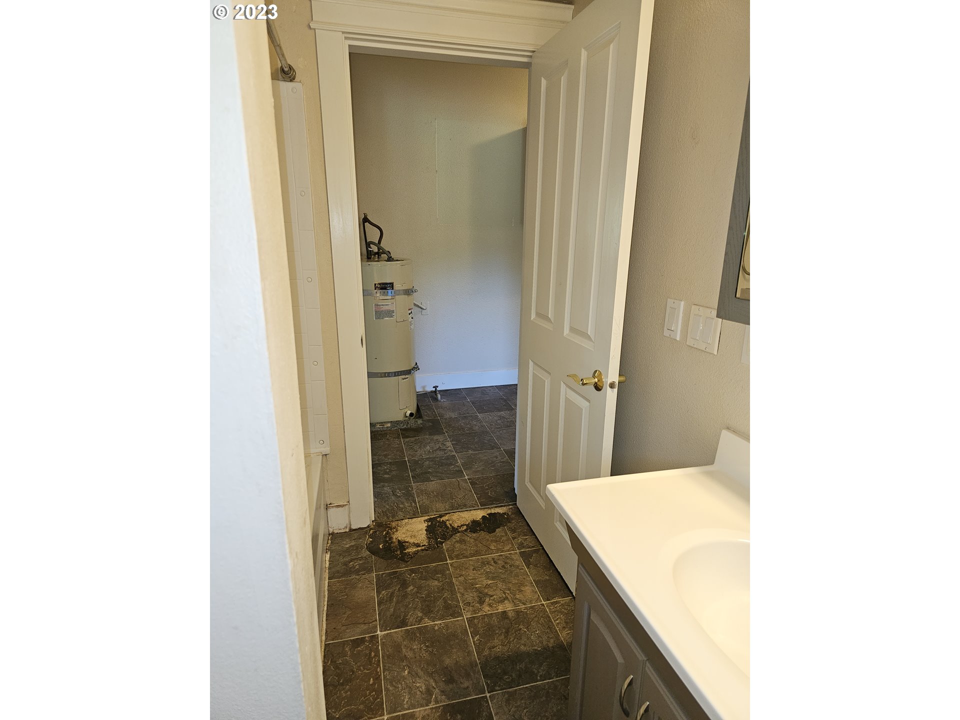 2644 Edison Street Eugene, OR 97402 - Photo 20 of 29 a bathroom with a granite countertop sink and a mirror