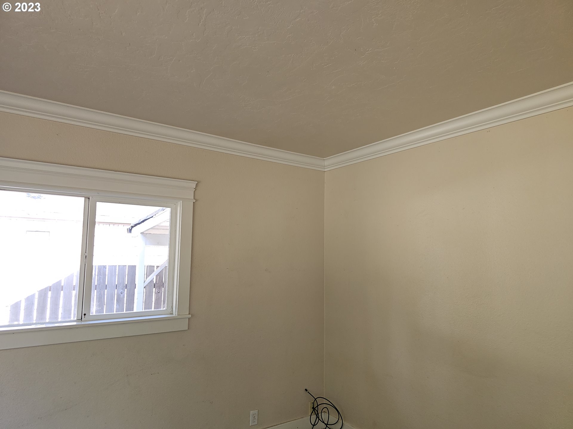 2644 Edison Street Eugene, OR 97402 - Photo 7 of 29 a view of an empty room with a window
