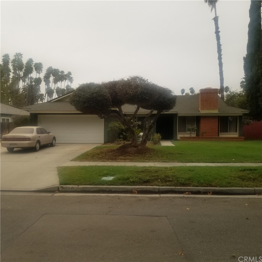 2620 Bubbling Well Road Riverside, CA 92501 - Photo 1 of 1 a front view of a house with a garden