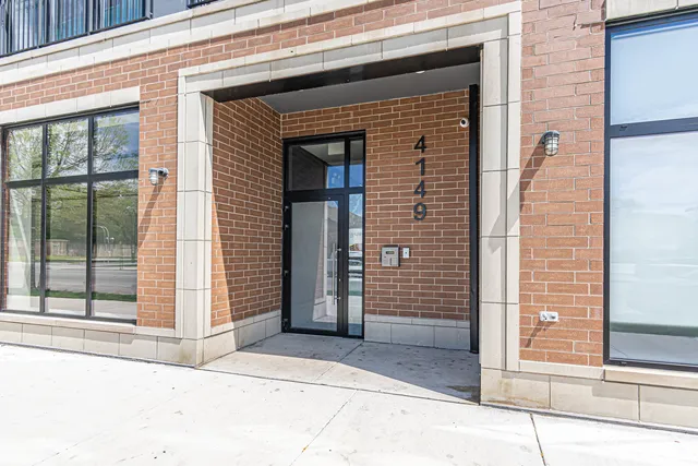 a view of a hallway with front door