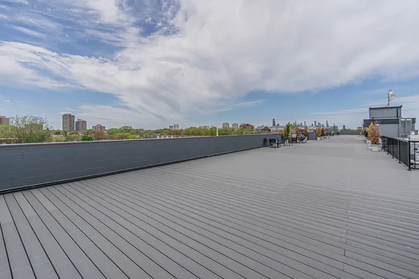 a view of a terrace with wooden floor