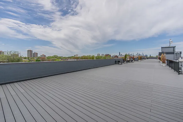 a view of a terrace with wooden floor
