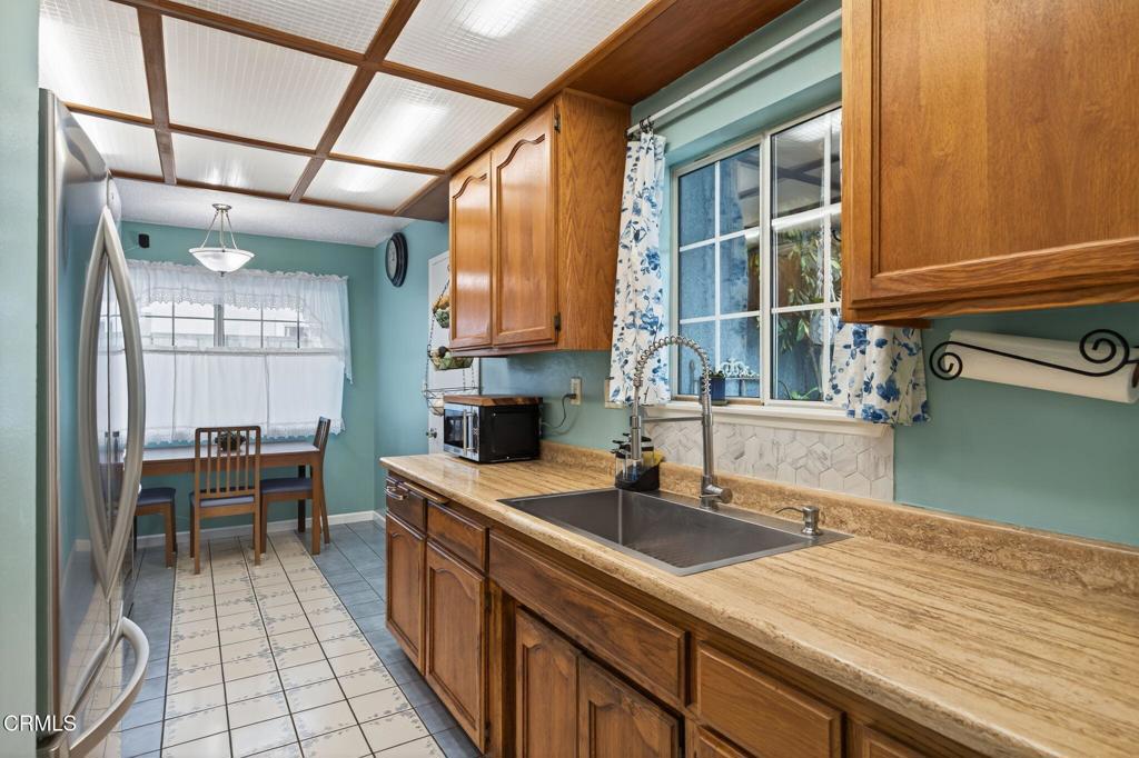 1501 Morris Street Oxnard, CA 93030 - Photo 15 of 34 a kitchen with a sink and cabinets