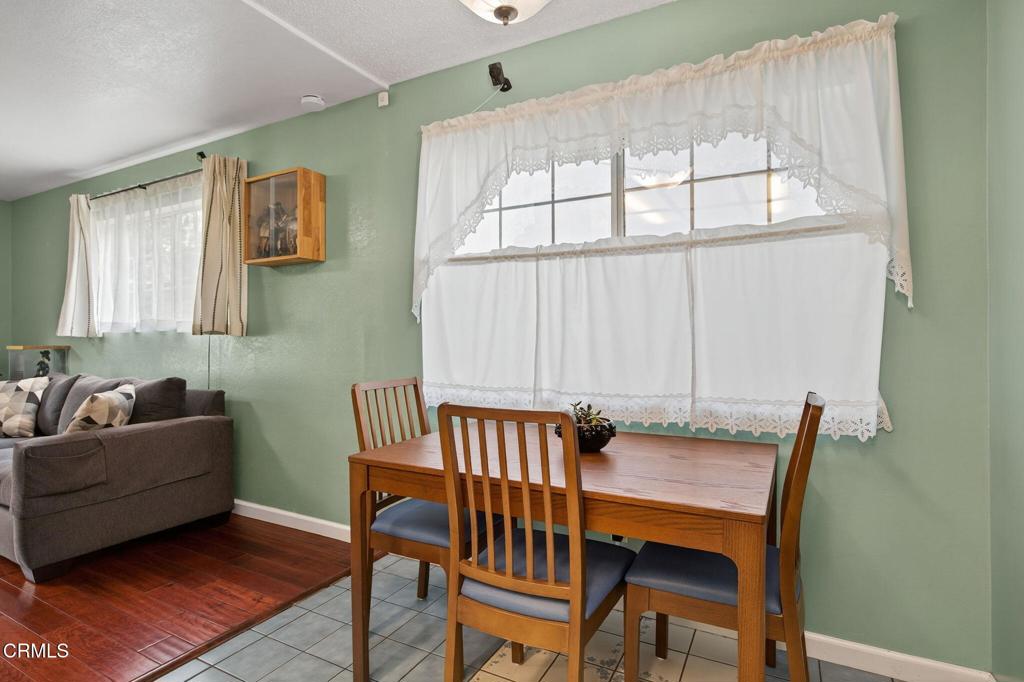 1501 Morris Street Oxnard, CA 93030 - Photo 18 of 34 a view of a dining room with furniture and window