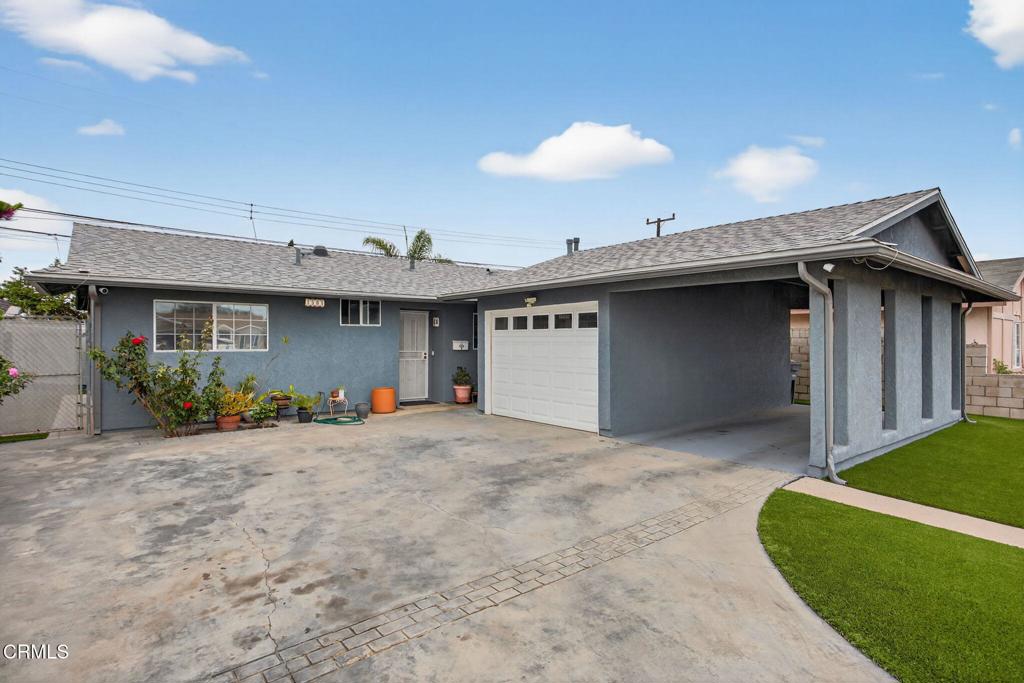 1501 Morris Street Oxnard, CA 93030 - Photo 4 of 34 a view of a house with a patio and a yard