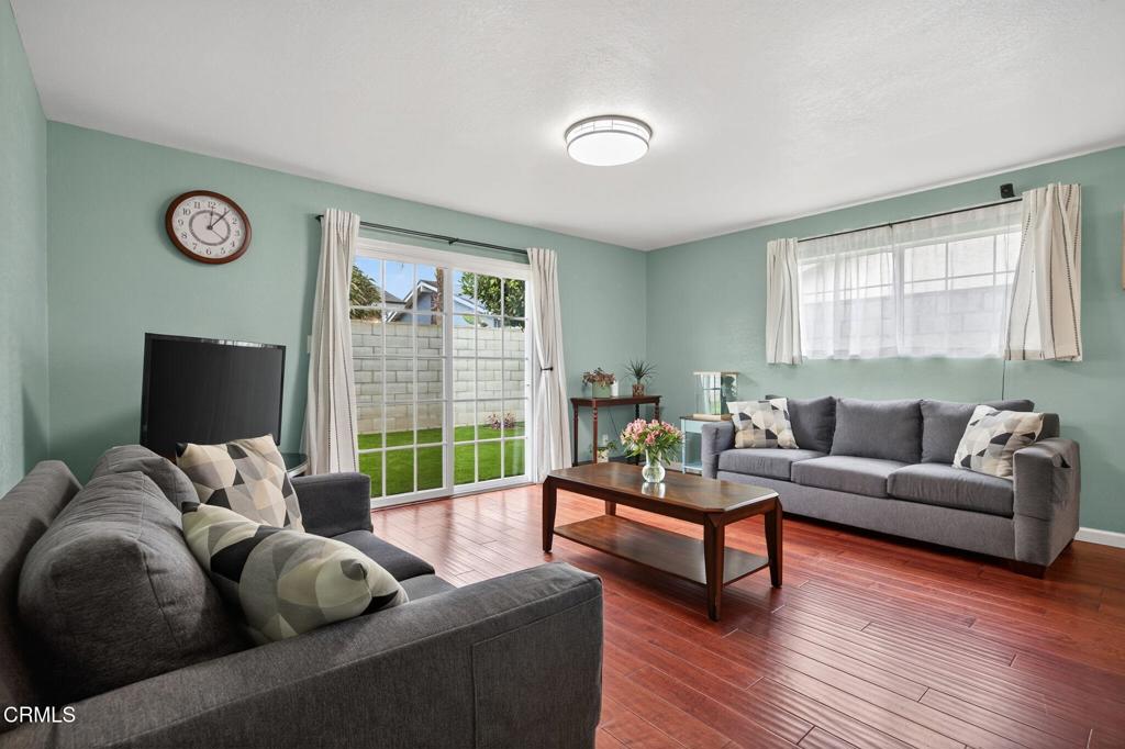 1501 Morris Street Oxnard, CA 93030 - Photo 8 of 34 a living room with furniture and a flat screen tv