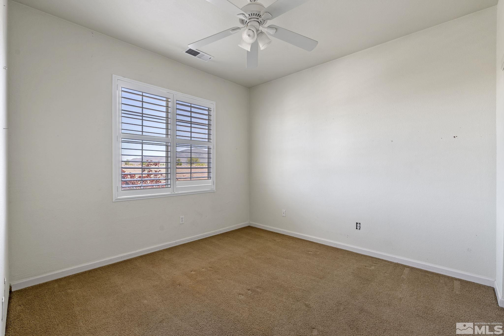 10568 Iron Point Circle Reno, NV 89521 - Photo 25 of 30 an empty room with a window