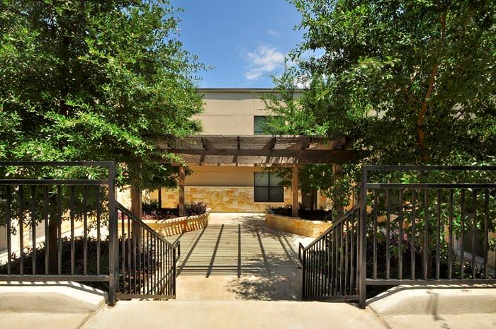 a view of backyard with a patio