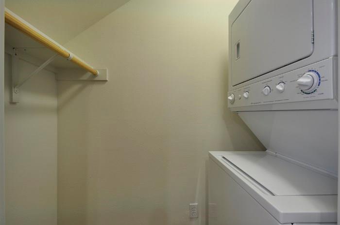 711 West 32nd Street, Unit 105 Austin, TX 78705 - Photo 8 of 11 a utility room with dryer and washer