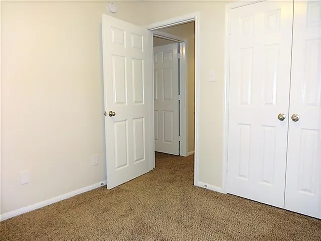 an empty room with a door