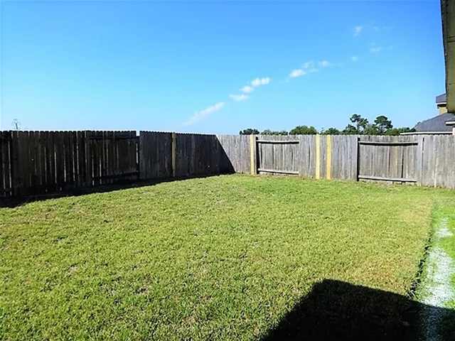 a house view with a garden space