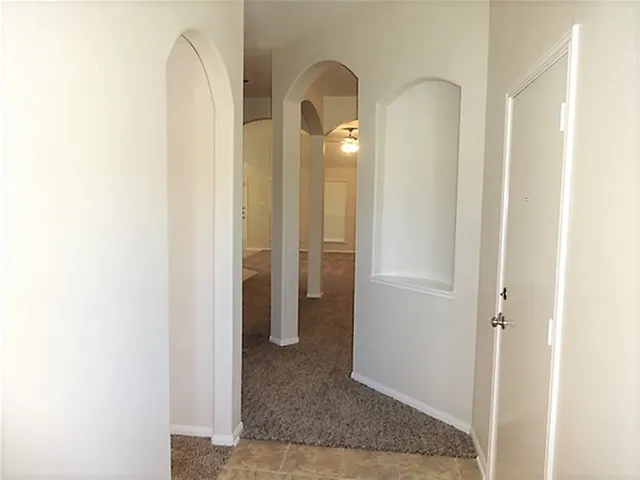 a view of a bathroom with mirror