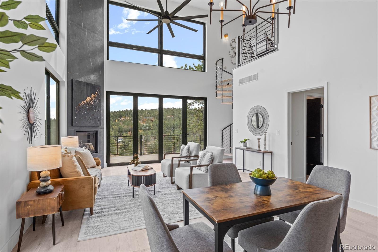542 Conifer Drive Bailey, CO 80421 - Photo 24 of 47 a living room with furniture