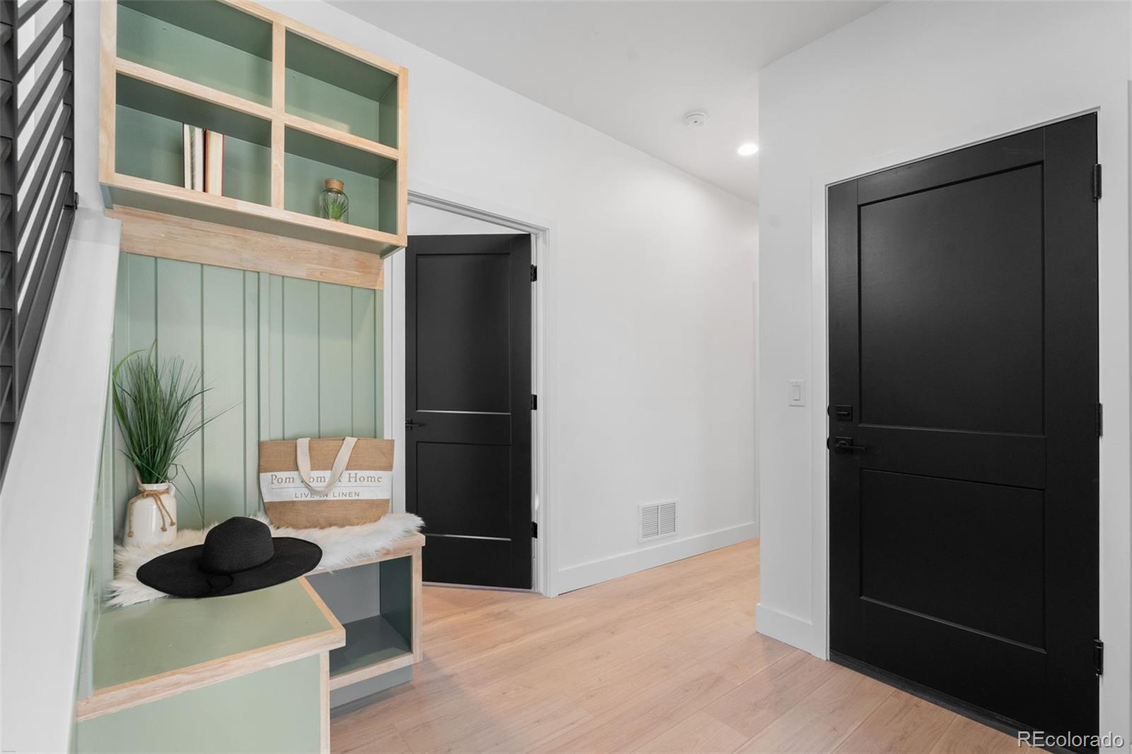 542 Conifer Drive Bailey, CO 80421 - Photo 10 of 47 a living room with furniture and a potted plant