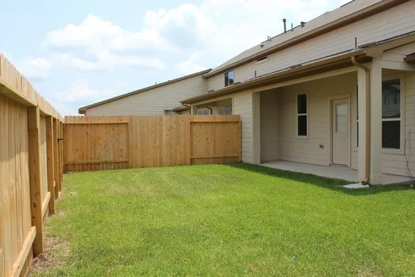 a view of backyard of house