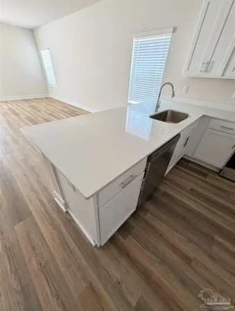 a view of kitchen and utility room