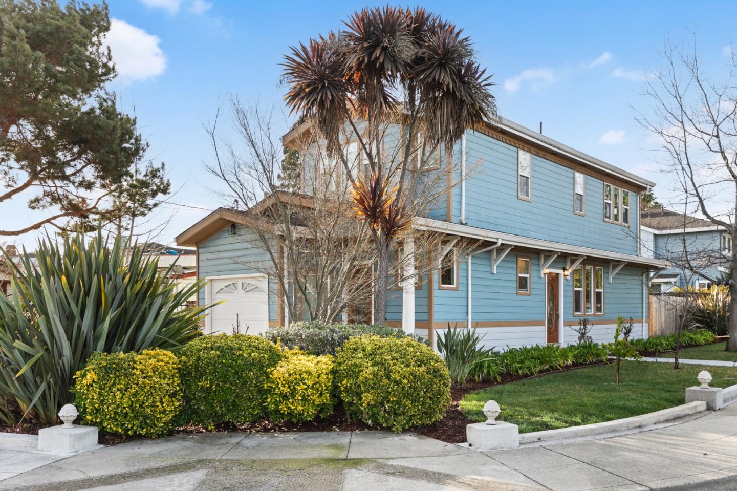 1095 Wright Avenue Mountain View, CA 94043 - Photo 1 of 29 a front view of a house with garden