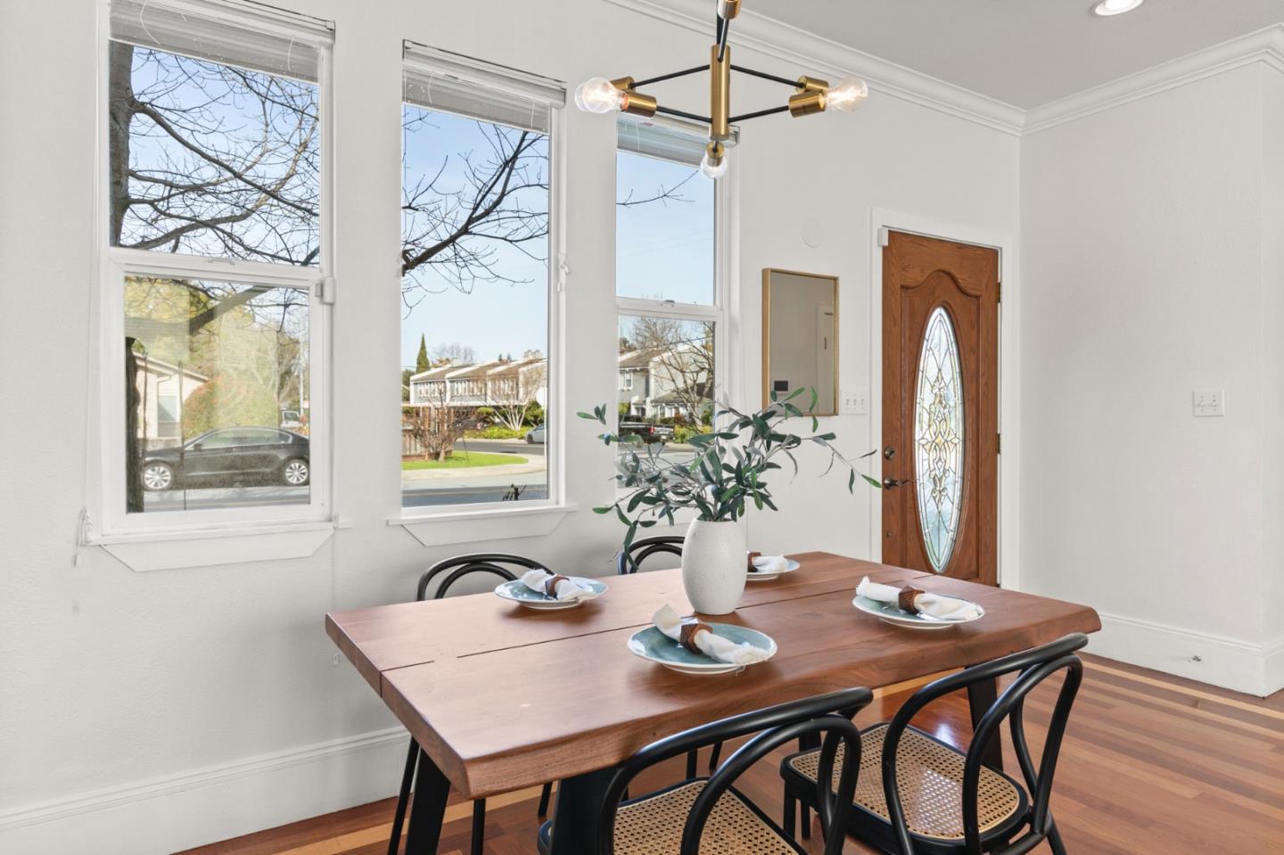 1095 Wright Avenue Mountain View, CA 94043 - Photo 12 of 29 a view of a dining room with furniture window and wooden floor